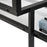 Close-up of the black Tangled Cabinet by Pastoe, showcasing its intricate storage design and textured surface with books nearby.