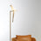 Modern Moooi Perch Floor Light with sleek design and adjustable arm, providing stylish illumination for living spaces.