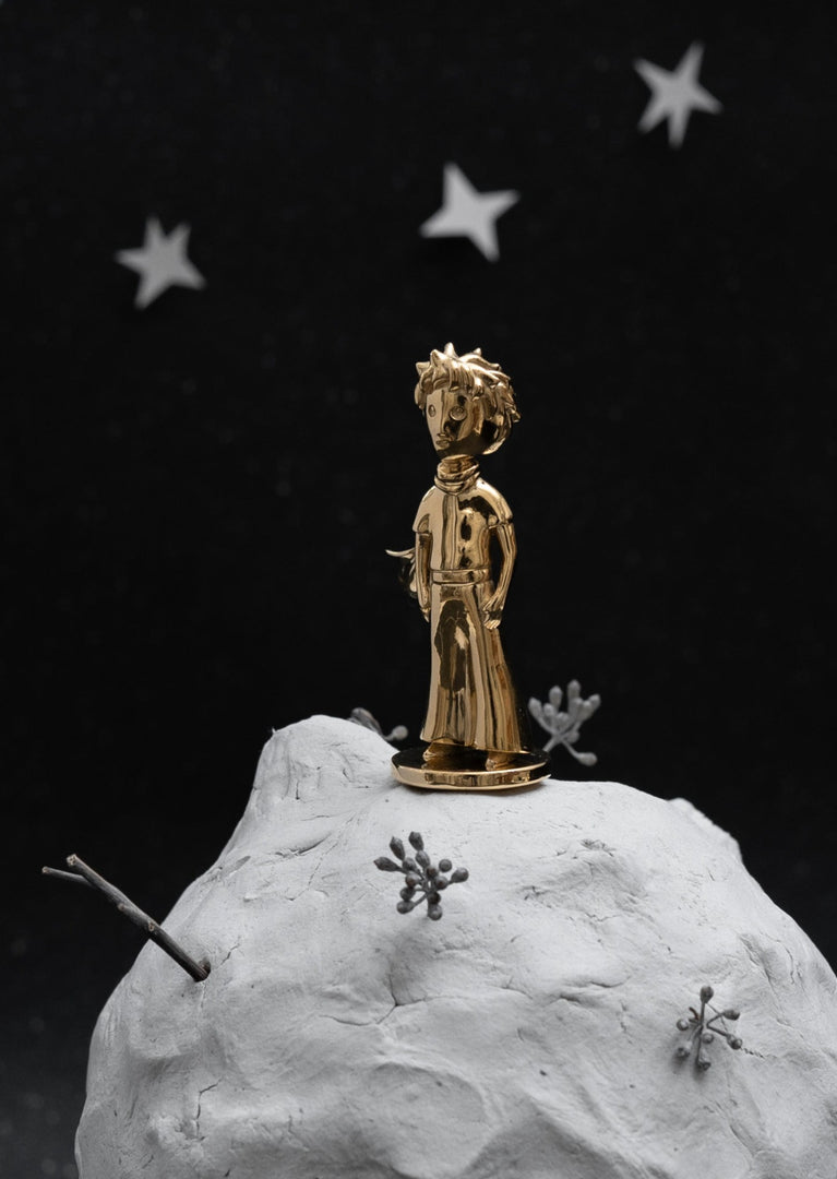 Skultuna Le Petit Prince accessories featuring a small decorative item inspired by Le Petit Prince character.
