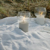 Set of two Rig-Tig Hygge Hurricane vegetable candle refills, outdoor accessories with colorful, vegetable-inspired designs for candles.