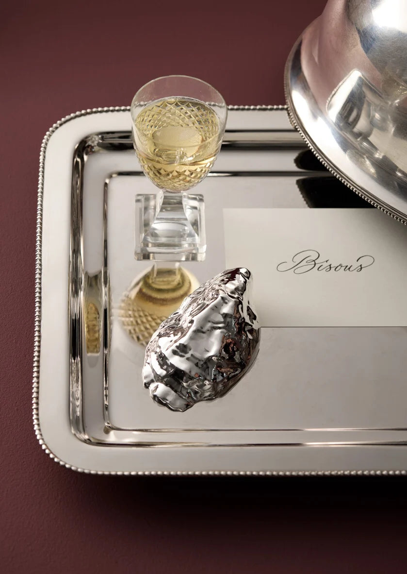 Silver-plated Oyster bottle opener by Skultuna, showcasing a sleek and elegant accessories design with a polished finish.