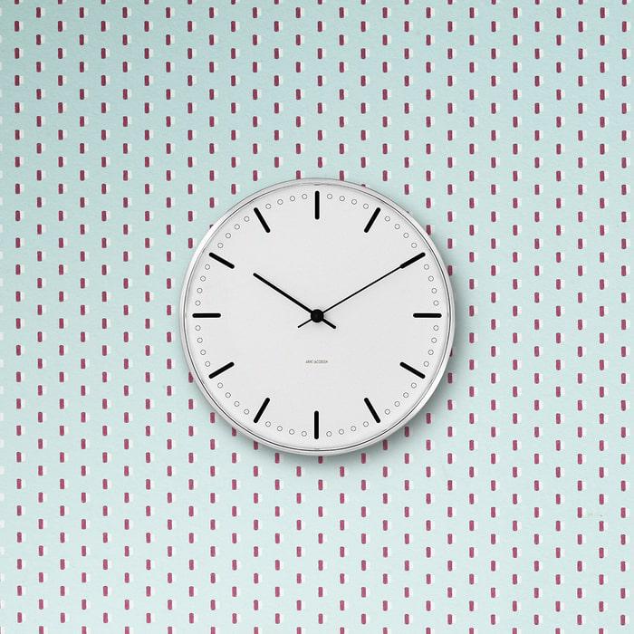 Arne Jacobsen City Hall Wall Clock, modern accessories with a sleek round design, black hour and minute hands on a white face.