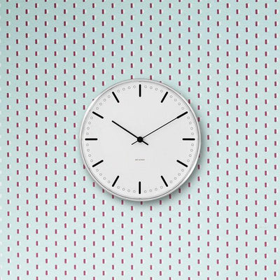 Arne Jacobsen City Hall Wall Clock, modern accessories with a sleek round design, black hour and minute hands on a white face.