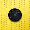 Arne Jacobsen Bankers Wall Clock, minimalist modern accessories with a sleek round design in neutral tones.