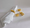 Brass Muse Napkin Rings by Jonathan Adler