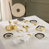 Brass Muse Napkin Rings by Jonathan Adler