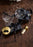 Skultuna Lisa Larson lion wine stopper accessory with detailed lion design on shiny metal.