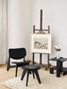 Black Slab Lounge Chair by Tom Dixon with brushed oak frame and black leather upholstery, showcasing modern seating design.