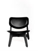 Black brushed oak Slab Lounge Chair by Tom Dixon with black leather upholstery, showcasing modern seating design.