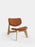 Tom Dixon Slab lounge chair with natural brushed oak frame and cognac leather cushions, modern seating with stylish design.