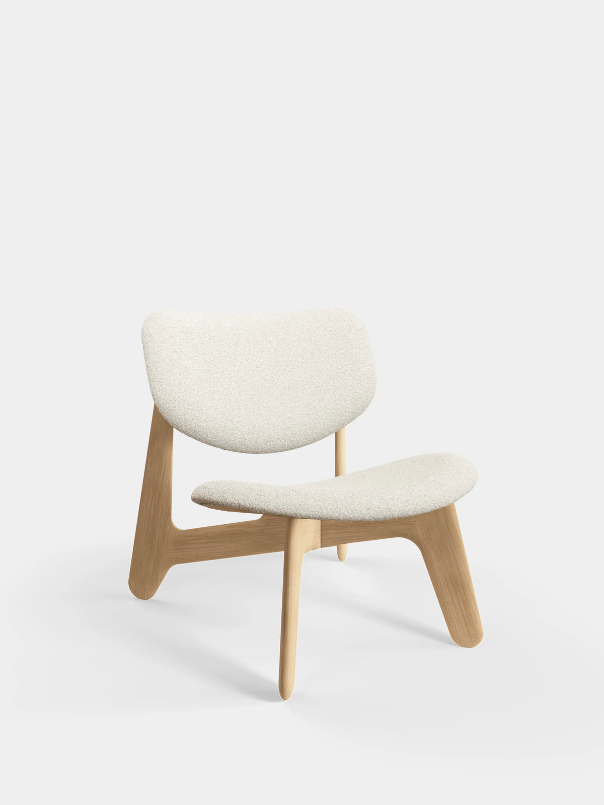Natural wood Slab Lounge Chair by Tom Dixon with Kvadrat Elle Boucle upholstery, modern seating for stylish interiors.