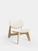 Natural wood Slab Lounge Chair by Tom Dixon with Kvadrat Elle Boucle upholstery, modern seating for stylish interiors.