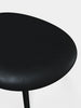 Black brushed oak Slab Ottoman by Tom Dixon with black leather seating, modern and sleek seating furniture.