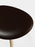 Brown leather Slab Ottoman by Tom Dixon, modern seating piece with a sleek, minimalist design and textured surface.