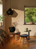 Tom Dixon Slab Ottoman in natural brushed oak with black leather seating, modern seating piece with sleek design.