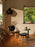 Tom Dixon Slab Ottoman in natural brushed oak with black leather seating, modern seating piece with sleek design.