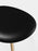 Tom Dixon Slab Ottoman with natural brushed oak frame and black leather seating, modern and stylish seating piece.