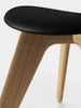 Tom Dixon Slab Ottoman with natural brushed oak and black leather upholstery, versatile seating piece with modern design.
