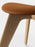 Tom Dixon Slab Ottoman with natural brushed oak base and cognac leather seating, modern and stylish seating furniture.