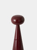 Tom Dixon Brew Mill accessory with a matte burgundy finish, small coffee grinder with a sleek, modern design.