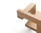 Pastoe Stelman Chair with left armrest, natural wood finish, showcasing Gerrit Rietveld-inspired seating design.