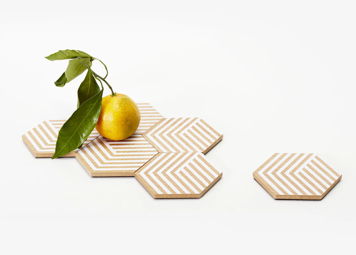 Areaware Table Tiles Coasters with optic white silo design, modern accessory for protecting surfaces from drinks.