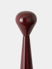 Tom Dixon Brew Mill accessory with matte burgundy finish, tall grinder design for coffee or spice grinding.