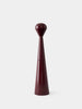 Tom Dixon Brew Mill accessory with a tall matte burgundy grinder for coffee or spices, featuring a sleek, modern design.