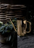Skultuna Nurture watering can accessory with a sleek, modern design, made of metal, perfect for watering plants and garden care.