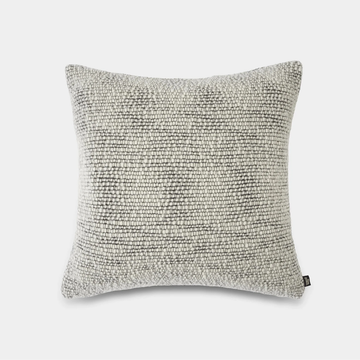 Black Thread Cushion by Tom Dixon, a stylish accessory with textured fabric and modern design, perfect for contemporary decor.