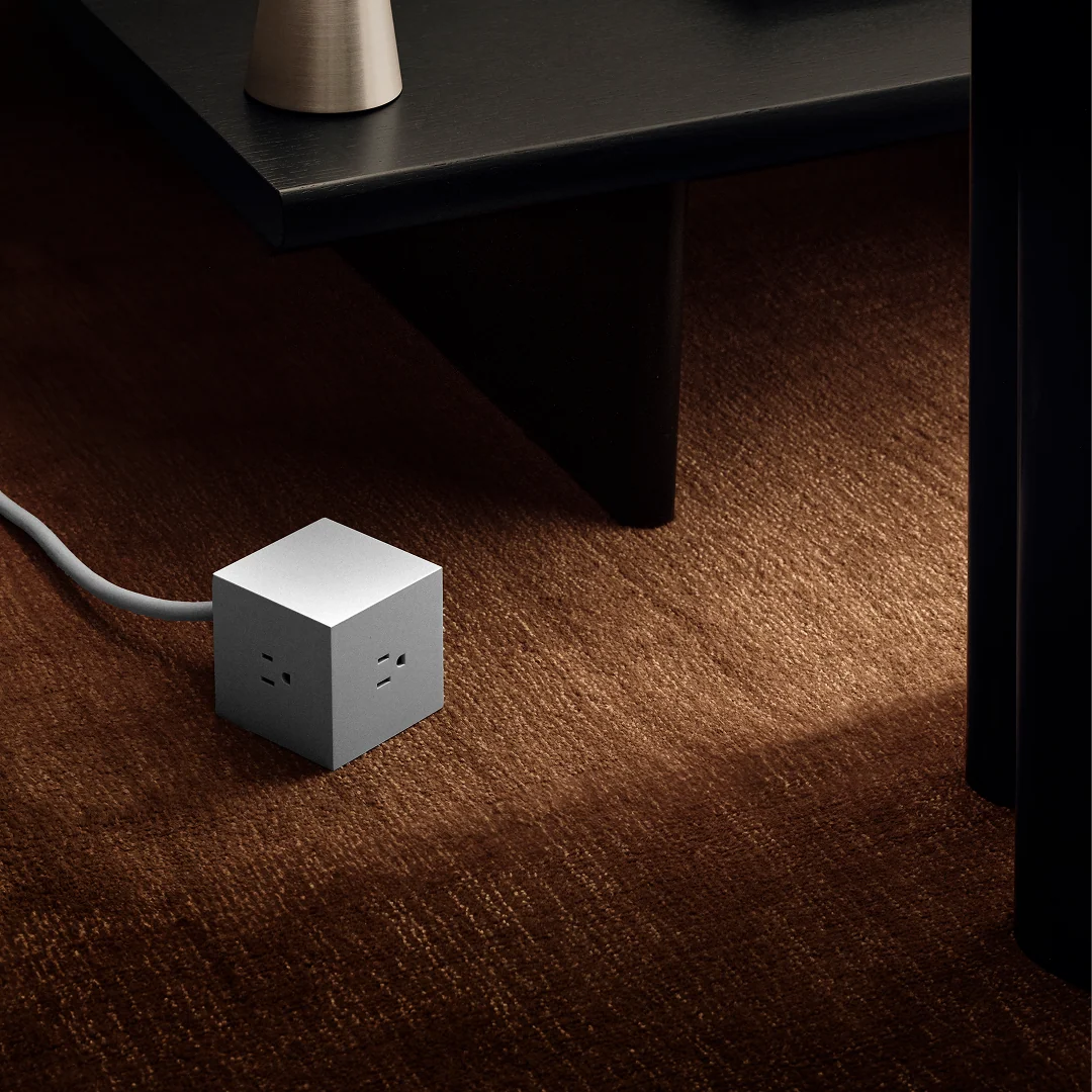 White Square 1 Extension Cord by Avolt, accessory with multiple outlets and power switch, designed for versatile electrical connections.
