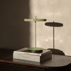 UMAGE Asteria Move portable lamp in Monochrome Leaf finish displayed in a lifestyle setting