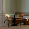 Asteria Move portable lamp by UMAGE in polished steel finish, shown in a lifestyle setting
