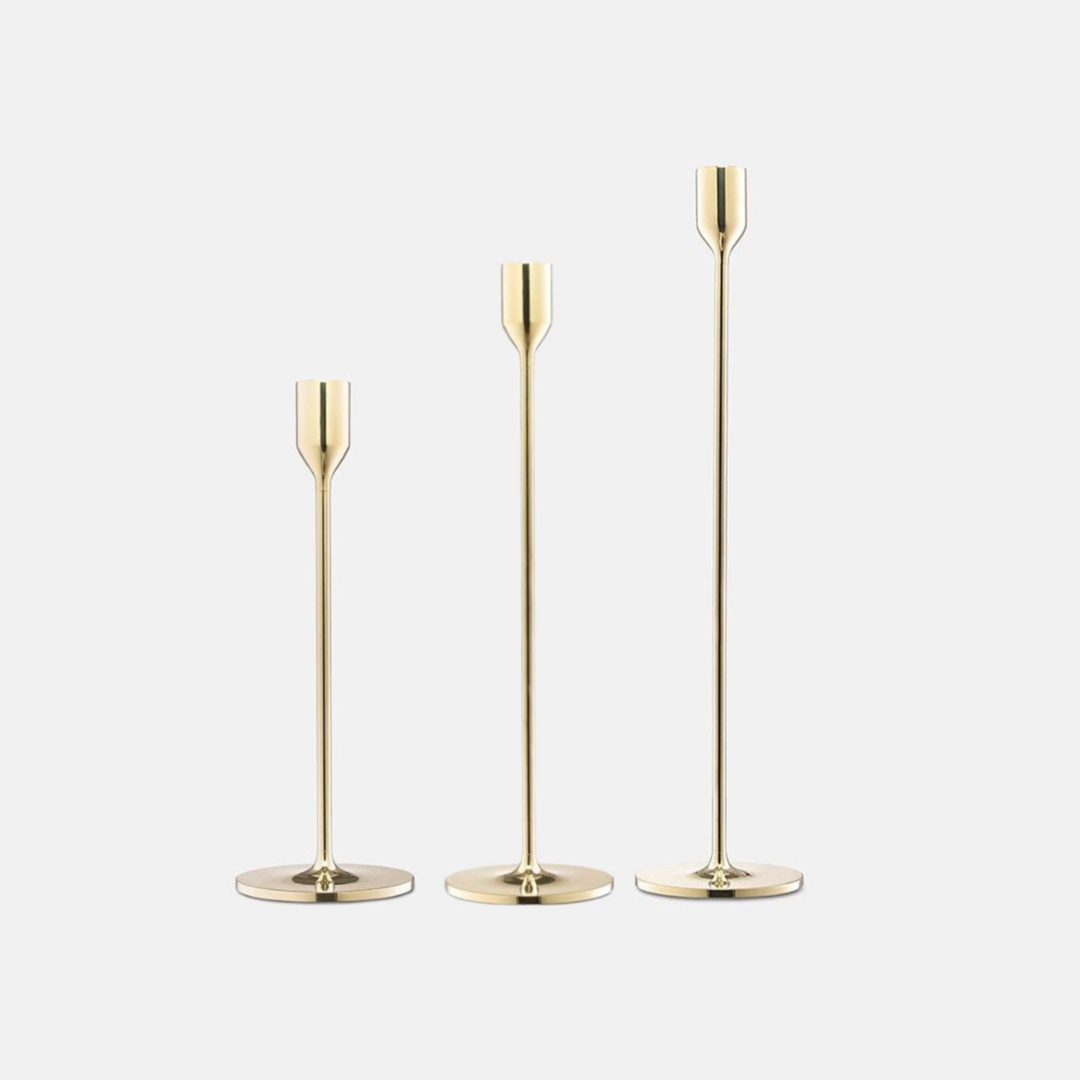 Skultuna Nattlight candlestick accessory with a sleek, modern design featuring a metallic finish and minimalist style.