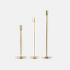 Skultuna Nattlight candlestick accessory with a sleek, modern design featuring a metallic finish and minimalist style.