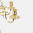 Elegant Skultuna candelabra accessory with polished metal finish, featuring multiple arms for candles and decorative design.