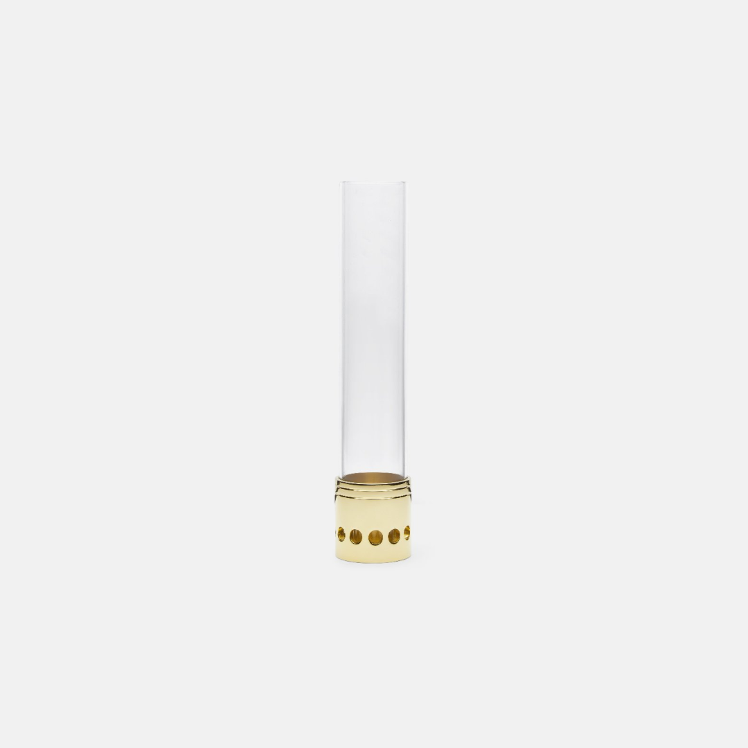 Skultuna Hurricane accessory with a sleek, modern design featuring a glass hurricane holder and metal accents.