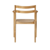 Ferm Living Boda dining chair with arms, showcasing modern design and wooden frame, ideal for stylish dining spaces.