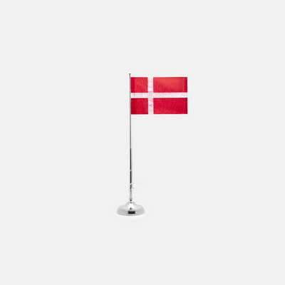 Skultuna Flagpole Classic accessory featuring a sleek, modern design in polished metal with a sturdy base.