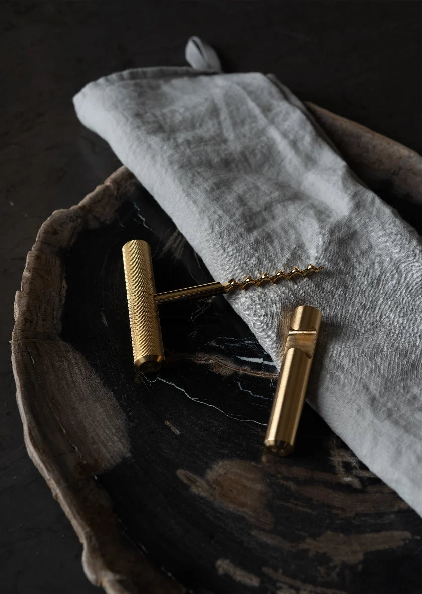Skultuna wine and bottle opener accessory with a sleek, modern design, featuring a metal screw mechanism for effortless opening.
