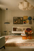 Nazar wool rug by Lorena Canals featuring a geometric eye motif in neutral tones