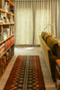 Pillar wool runner rug by Lorena Canals in a neutral woven design for hallway or bedroom floors