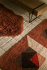 Tessera wool rug in small size by Lorena Canals, featuring a red geometric design