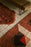 Tessera wool rug in small size by Lorena Canals, featuring a red geometric design