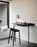 Woud Mono Counter Chair in seating, featuring a sleek, minimalist design with a wooden frame and modern aesthetic.