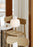 Woud Stone Pendant Glass lighting fixture hanging from ceiling with a smooth stone-shaped glass shade.