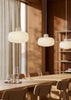 Woud Stone Pendant Glass lighting fixture hanging with a smooth stone-shaped glass shade, modern design.