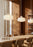 Woud Stone Pendant Glass lighting fixture hanging with a smooth stone-shaped glass shade, modern design.
