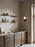 Woud Stedge floating shelf in smoked oak, 60 cm, modern storage unit with clean lines and natural wood finish.