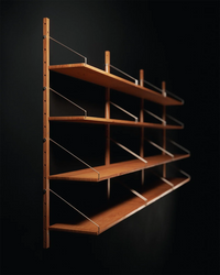 Natural oak shelf library by Frama Denmark, showing modular storage sections with sleek, minimalist design.